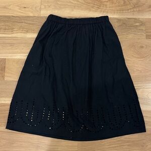 Laser cut-out midi skirt